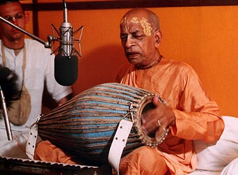 Prabhupada Chanting his rounds, Singing Bhajans, and Reading his Books