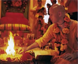 Fire ceremony sanctifies initiation of new devotees. Essentially unchanged for thousands of years, the Vedic rite shows the authenticity of ISKCON's life-style.